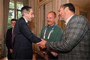27 July 2024; An Taoiseach Simon Harris TD, left, shakes hands with Olympic silver medallist Kenneth Egan during the Irish Embassy reception at the Embassy of Ireland during the 2024 Paris Summer Olympic Games in Paris, France. Photo by Sam Barnes/Sportsfile