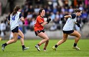 27 July 2024; Aoibhín Donohue of Armagh in action against Grace Carrigon, left, and Rebecca Walsh of Waterford during the ZuCar All-Ireland Ladies Football U-18 Championship C final match between Armagh and Waterford at Kinnegad GAA in Westmeath. Photo by Piaras Ó Mídheach/Sportsfile