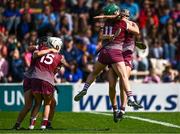 27 July 2024; Galway players including Niamh McPeake,11 and Carrie Dolan, right, after their side's victory in the Glen Dimplex Camogie All-Ireland Senior Championship semi-final match between Galway and Tipperary at UPMC Nowlan Park in Kilkenny. Photo by Harry Murphy/Sportsfile