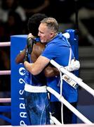 28 July 2024; Roscoe Hill of Team USA celebrates with Team USA boxing coach Billy Walsh after winning his men's 51kg preliminary round of 32 bout against Omid Ahmadisafa of Olympic Refugee Team at the North Paris Arena during the 2024 Paris Summer Olympic Games in Paris, France. Photo by David Fitzgerald/Sportsfile