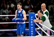 28 July 2024; Aidan Walsh of Team Ireland, alongside Team Ireland head coach Zaur Antia, centre, and Team Ireland coach Damien Kennedy before facing Makan Traore of Team France in their men's 71kg preliminary round of 32 bout at the North Paris Arena during the 2024 Paris Summer Olympic Games in Paris, France. Photo by David Fitzgerald/Sportsfile