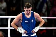 28 July 2024; Aidan Walsh of Team Ireland dejected after being defeated by Makan Traore of Team France in their men's 71kg preliminary round of 32 bout at the North Paris Arena during the 2024 Paris Summer Olympic Games in Paris, France. Photo by David Fitzgerald/Sportsfile