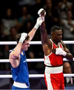 28 July 2024; Aidan Walsh of Team Ireland, left, with Makan Traore of Team France after their men's 71kg preliminary round of 32 bout at the North Paris Arena during the 2024 Paris Summer Olympic Games in Paris, France. Photo by David Fitzgerald/Sportsfile