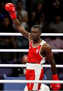28 July 2024;  Makan Traore of Team France celebrates after defeating Aidan Walsh of Team Ireland in their men's 71kg preliminary round of 32 bout at the North Paris Arena during the 2024 Paris Summer Olympic Games in Paris, France. Photo by David Fitzgerald/Sportsfile