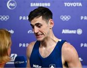 28 July 2024; Aidan Walsh of Team Ireland reacts during an interview with RTÉ after his defeat by Makan Traore of Team France in their men's 71kg preliminary round of 32 bout at the North Paris Arena during the 2024 Paris Summer Olympic Games in Paris, France. Photo by David Fitzgerald/Sportsfile