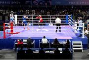 28 July 2024; A general view of Aidan Walsh of Team Ireland, left, in action against Makan Traore of Team France in their men's 71kg preliminary round of 32 bout at the North Paris Arena during the 2024 Paris Summer Olympic Games in Paris, France. Photo by David Fitzgerald/Sportsfile