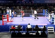 28 July 2024; A general view of Aidan Walsh of Team Ireland, left, in action against Makan Traore of Team France in their men's 71kg preliminary round of 32 bout at the North Paris Arena during the 2024 Paris Summer Olympic Games in Paris, France. Photo by David Fitzgerald/Sportsfile