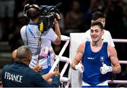 28 July 2024; Aidan Walsh of Team Ireland gestures towards the Team France corner after being defeated by Makan Traore of Team France in their men's 71kg preliminary round of 32 bout at the North Paris Arena during the 2024 Paris Summer Olympic Games in Paris, France. Photo by David Fitzgerald/Sportsfile