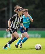 28 July 2024; Jane McKevitt of Whitehall Rangers in action against Jess Hunt of Terenure Rangers during the FAI Women's Amateur Cup Final 2024 match between Whitehall Rangers and Terenure Rangers at UCD Bowl in Dublin. Photo by Michael P Ryan/Sportsfile