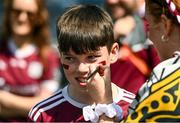 28 July 2024; Galway supporter Colin Higgins, aged 12, from Moylough, Galway, gets his face painted ahead of the GAA Football All-Ireland Senior Championship Final match between Armagh and Galway at Croke Park in Dublin. Photo by Daire Brennan/Sportsfile