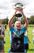 28 July 2024; Terenure Rangers manager Caroline Kelly celebrates with the cup after the FAI Women's Amateur Cup Final 2024 match between Whitehall Rangers and Terenure Rangers at UCD Bowl in Dublin. Photo by Michael P Ryan/Sportsfile