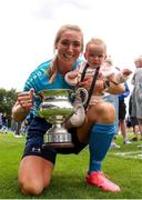 28 July 2024; Jenny Claffey of Terenure Rangers with her daughter, Indie, age 1, after the FAI Women's Amateur Cup Final 2024 match between Whitehall Rangers and Terenure Rangers at UCD Bowl in Dublin. Photo by Michael P Ryan/Sportsfile