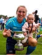 28 July 2024; Jenny Claffey of Terenure Rangers with her daughter, Indie, age 1, after the FAI Women's Amateur Cup Final 2024 match between Whitehall Rangers and Terenure Rangers at UCD Bowl in Dublin. Photo by Michael P Ryan/Sportsfile