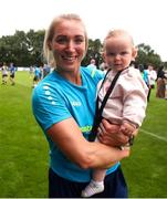 28 July 2024; Jenny Claffey of Terenure Rangers, with daughter indie, age 1, after the FAI Women's Amateur Cup Final 2024 match between Whitehall Rangers and Terenure Rangers at UCD Bowl in Dublin. Photo by Michael P Ryan/Sportsfile