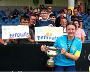 28 July 2024; Terenure Rangers captain Niamh Carroll celebrates with family after the FAI Women's Amateur Cup Final 2024 match between Whitehall Rangers and Terenure Rangers at UCD Bowl in Dublin. Photo by Michael P Ryan/Sportsfile
