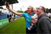 28 July 2024; Jenny Claffey of Terenure Rangers takes a photograph with her daughter Indie, and brother Mark after the FAI Women's Amateur Cup Final 2024 match between Whitehall Rangers and Terenure Rangers at UCD Bowl in Dublin. Photo by Michael P Ryan/Sportsfile