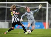 28 July 2024; Terenure Rangers goalkeeper Niamh Geraghty in action against Charlie Graham of Whitehall Rangers during the FAI Women's Amateur Cup Final 2024 match between Whitehall Rangers and Terenure Rangers at UCD Bowl in Dublin. Photo by Michael P Ryan/Sportsfile