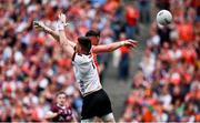 28 July 2024; Aaron McKay of Armagh scores his side's first goal despite the efforts of Galway goalkeeper Connor Gleeson during the GAA Football All-Ireland Senior Championship Final match between Armagh and Galway at Croke Park in Dublin. Photo by Ramsey Cardy/Sportsfile