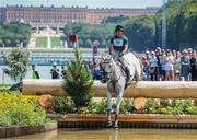 28 July 2024; Austin O’Connor of Team Ireland riding Colorado Blue during the eventing individual cross country at the Château de Versailles during the 2024 Paris Summer Olympic Games in Paris, France. Photo by Pierre Costabadie/Sportsfile