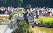 28 July 2024; Austin O’Connor of Team Ireland riding Colorado Blue during the eventing individual cross country at the Château de Versailles during the 2024 Paris Summer Olympic Games in Paris, France. Photo by Pierre Costabadie/Sportsfile