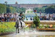 28 July 2024; Austin O’Connor of Team Ireland riding Colorado Blue during the eventing individual cross country at the Château de Versailles during the 2024 Paris Summer Olympic Games in Paris, France. Photo by Pierre Costabadie/Sportsfile