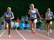 28 July 2024; Mollie O`Reilly, right, from Dundrum South Dublin AC on her way to winning the Premier Women's 100m, ahead of second place finisher Molly Scott from St Laurence O Tooles AC during the 123.ie National Track and Field League Final at Tullamore Harriers Athletics Club in Offaly. Photo by Matt Browne/Sportsfile