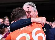 28 July 2024; Jarly Óg Burns of Armagh celebrates with his father, Uachtarán Chumann Lúthchleas Gael Jarlath Burns, after victory in the GAA Football All-Ireland Senior Championship Final match between Armagh and Galway at Croke Park in Dublin. Photo by Piaras Ó Mídheach/Sportsfile
