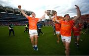 28 July 2024; Aidan Nugent, left, and Paddy Burns of Armagh with the Sam Maguire Cup the GAA Football All-Ireland Senior Championship Final match between Armagh and Galway at Croke Park in Dublin. Photo by Ramsey Cardy/Sportsfile