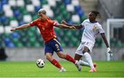 28 July 2024; Iker Bravo of Spain in action against Jérémy Jacquet of France during the UEFA European U19 Championship finals match between Spain and France at the National Football Stadium at Windsor Park, Belfast. Photo by Shauna Clinton/Sportsfile