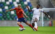 28 July 2024; Iker Bravo of Spain in action against Jérémy Jacquet of France during the UEFA European U19 Championship finals match between Spain and France at the National Football Stadium at Windsor Park, Belfast. Photo by Shauna Clinton/Sportsfile