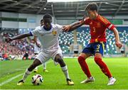 28 July 2024; Sael Kumbedi of France in action against Julio Diaz of Spain during the UEFA European U19 Championship finals match between Spain and France at the National Football Stadium at Windsor Park, Belfast. Photo by Shauna Clinton/Sportsfile