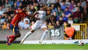 28 July 2024; Saimon Nadélia Bouabré of France in action against Cristian Perea of Spain during the UEFA European U19 Championship finals match between Spain and France at the National Football Stadium at Windsor Park, Belfast. Photo by Shauna Clinton/Sportsfile