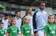 28 July 2024; France players, including Saimon Nadélia Bouabré, second from right, walk out with mascots before the UEFA European U19 Championship finals match between Spain and France at the National Football Stadium at Windsor Park, Belfast. Photo by Shauna Clinton/Sportsfile