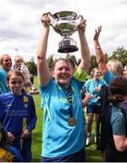 28 July 2024; Terenure Rangers captain Niamh Carroll lifts the cup after the FAI Women's Amateur Cup Final 2024 match between Whitehall Rangers and Terenure Rangers at UCD Bowl in Dublin. Photo by Michael P Ryan/Sportsfile