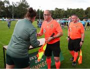 28 July 2024; Assistant James McDonnell receives his medal from FAI head of women's football Hannah Dingley after during the FAI Women's Amateur Cup Final 2024 match between Whitehall Rangers and Terenure Rangers at UCD Bowl in Dublin. Photo by Michael P Ryan/Sportsfile