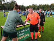 28 July 2024; Assistant Gareth Fletcher receives his medal from FAI head of women's football Hannah Dingley after during the FAI Women's Amateur Cup Final 2024 match between Whitehall Rangers and Terenure Rangers at UCD Bowl in Dublin. Photo by Michael P Ryan/Sportsfile