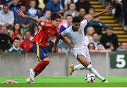 28 July 2024; Dehmaine Tabibou Assoumani of France in action against Julio Diaz of Spain during the UEFA European U19 Championship finals match between Spain and France at the National Football Stadium at Windsor Park, Belfast. Photo by Shauna Clinton/Sportsfile