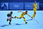 29 July 2024; Flynn Ogilvie of Team Australia in action against Sean Murray of Team Ireland during the men's pool B match between Team Ireland and Team Australia at the Yves-du-Manoir Stadium during the 2024 Paris Summer Olympic Games in Paris, France. Photo by David Fitzgerald/Sportsfile