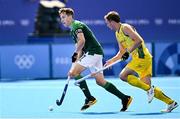 29 July 2024; Sean Murray of Team Ireland in action against Ky Willott of Team Australia during the men's pool B match between Team Ireland and Team Australia at the Yves-du-Manoir Stadium during the 2024 Paris Summer Olympic Games in Paris, France. Photo by David Fitzgerald/Sportsfile