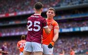 28 July 2024; Paddy Burns of Armagh and Tomo Culhane of Galway tussle during the GAA Football All-Ireland Senior Championship Final match between Armagh and Galway at Croke Park in Dublin. Photo by Ben McShane/Sportsfile