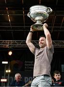 29 July 2024; Armagh captain Aidan Forker holds the Sam Maguire Cup aloft at the homecoming celebrations of the All-Ireland Senior Football Champions at BOX-IT Athletic Grounds in Armagh. Photo by Ramsey Cardy/Sportsfile