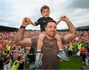 29 July 2024; Armagh captain Aidan Forker with his son Leo at the homecoming celebrations of the All-Ireland Senior Football Champions at BOX-IT Athletic Grounds in Armagh. Photo by Ramsey Cardy/Sportsfile
