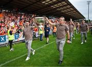 29 July 2024; Armagh captain Aidan Forker, left, and Armagh manager Kieran McGeeney hold the Sam Maguire Cup aloft at the homecoming celebrations of the All-Ireland Senior Football Champions at BOX-IT Athletic Grounds in Armagh. Photo by Ramsey Cardy/Sportsfile