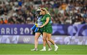 29 July 2024; Béibhinn Parsons of Team Ireland leaves the field with an injury during the Women's Rugby Sevens quarter-final match between Team Ireland and Team Australia at the Stade de France during the 2024 Paris Summer Olympic Games in Paris, France. Photo by David Fitzgerald/Sportsfile