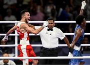 30 July 2024; Billal Bennama of Team France, left, celebrates after defeating Roscoe Hill of Team USA during their men's 51kg preliminary round of 16 bout at the North Paris Arena during the 2024 Paris Summer Olympic Games in Paris, France. Photo by David Fitzgerald/Sportsfile