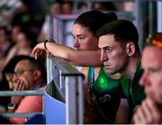 30 July 2024; Team Ireland boxers Aidan Walsh and Grainne Walsh watch on during the women's -54kg round of 16 bout between Jennifer Lehane of Team Ireland and Yuan Chang of Team China at the North Paris Arena during the 2024 Paris Summer Olympic Games in Paris, France. Photo by David Fitzgerald/Sportsfile