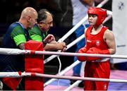 30 July 2024; Jennifer Lehane of Team Ireland speaks with Team Ireland head coach Zaur Antia, centre, and Team Ireland coach Damian Kennedy, left, during her women's -54kg round of 16 bout against Yuan Chang of Team China at the North Paris Arena during the 2024 Paris Summer Olympic Games in Paris, France. Photo by David Fitzgerald/Sportsfile