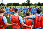 31 July 2024; Players huddle following a Leinster rugby training session at UCD in Dublin. Photo by Ramsey Cardy/Sportsfile