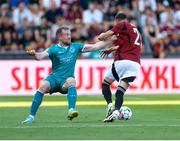 30 July 2024; Sean Hoare of Shamrock Rovers in action against Ermal Krasniqi of Sparta Prague during the UEFA Champions League Second Qualifying Round second leg match between Sparta Prague and Shamrock Rovers at Letná Stadium in Prague, Czechia. Photo by Pavel Lebeda/Sportsfile