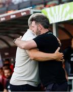 30 July 2024; Shamrock Rovers manager Stephen Bradley, right, is greeted by Sparta Prague manager Lars Friis during the UEFA Champions League Second Qualifying Round second leg match between Sparta Prague and Shamrock Rovers at Letná Stadium in Prague, Czechia. Photo by Pavel Lebeda/Sportsfile